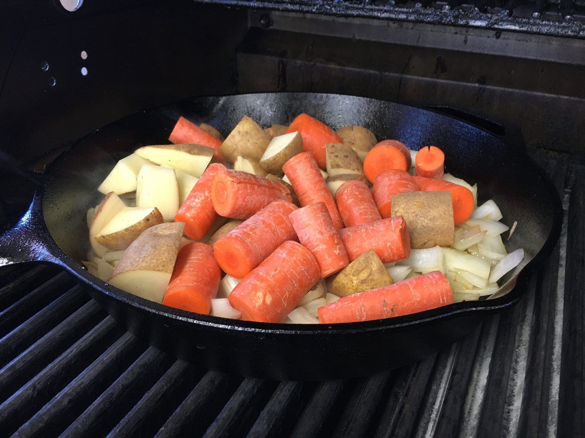 cooking carrots, onions, potatoes Nebraska Star Beef